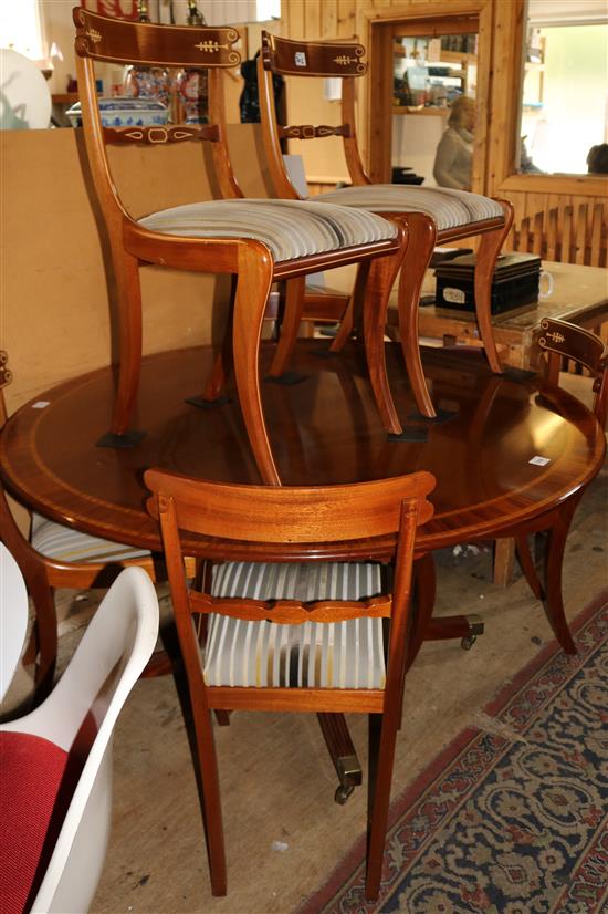 Reproduction mahogany circular breakfast table and six chairs(-)